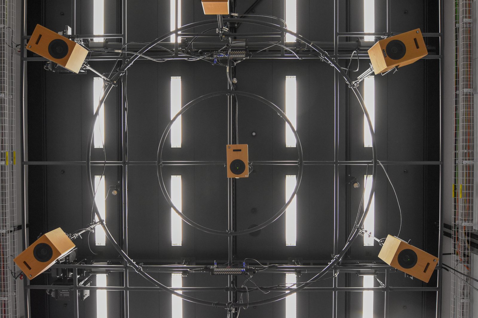 Loudspeakers suspended above the listening area in the ICST studio.
